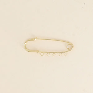 Broche à Charms