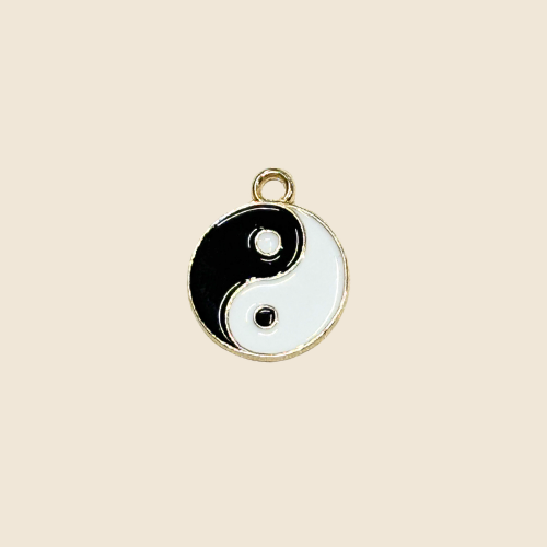 Ying-yang en laiton