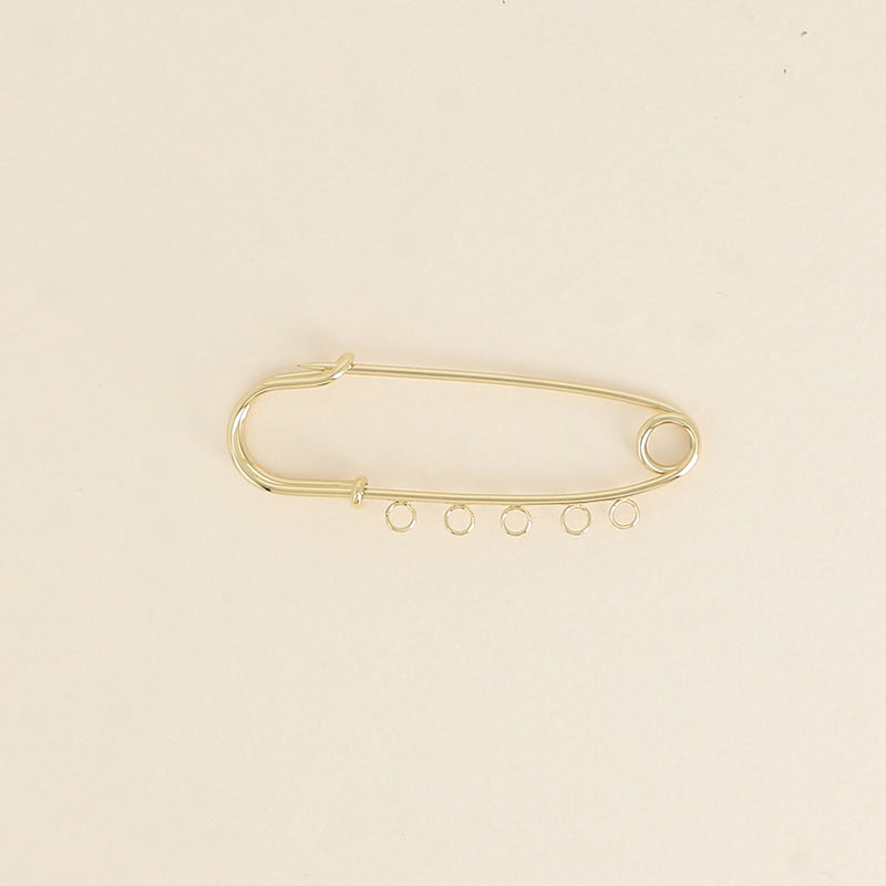 Broche à Charms