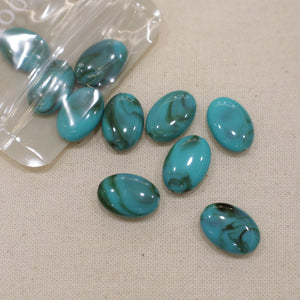 Perles ovales en acétate (lot de 10)