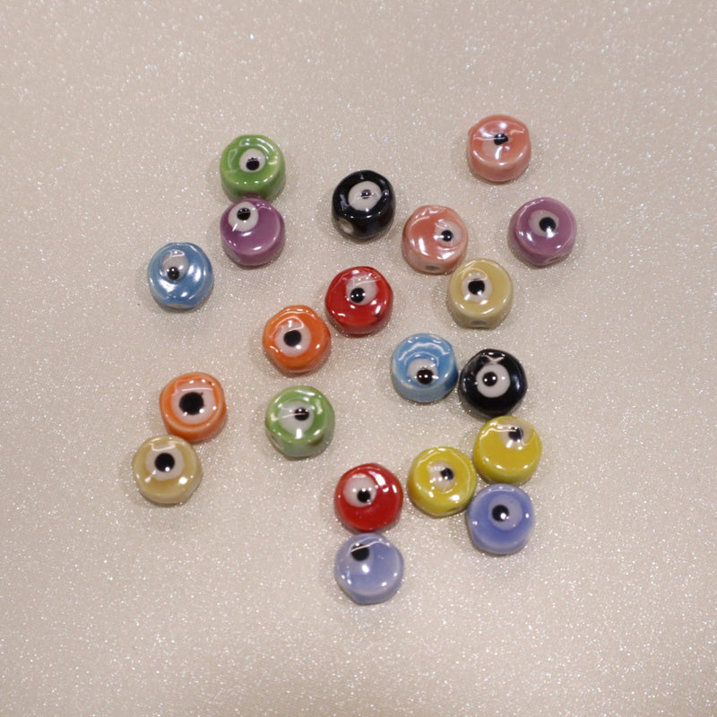Perle en céramique -  Petit œil (lot de 10)