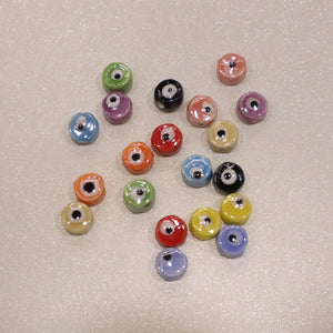 Perle en céramique -  Petit œil (lot de 10)
