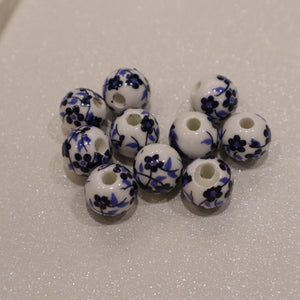 Perle ronde en céramique - motif fleuri (lot de 10)