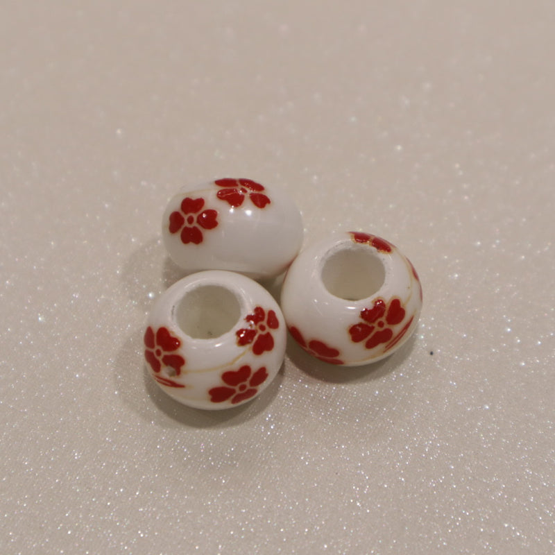 Perle torique en céramique - motif fleuri (lot de 10)