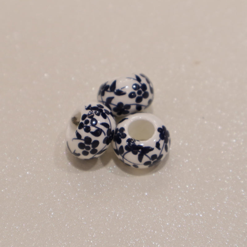 Perle torique en céramique - motif fleuri (lot de 10)
