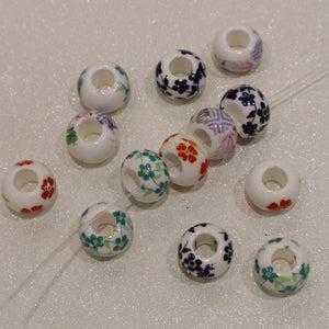 Perle torique en céramique - motif fleuri (lot de 10)