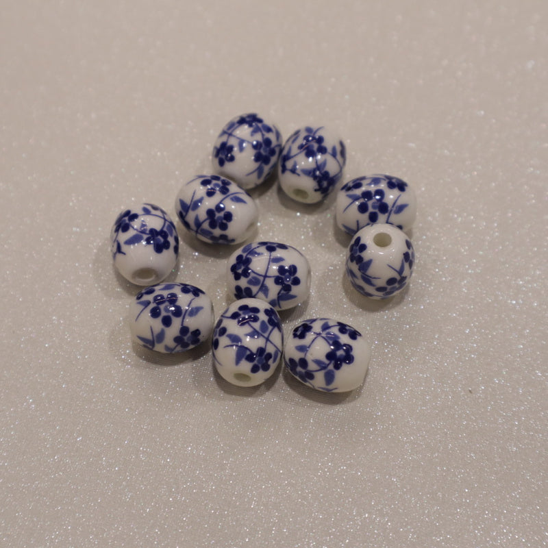 Perle ovale en céramique - motif fleuri (lot de 10)