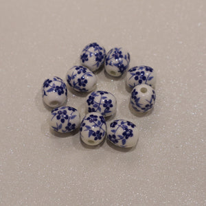 Perle ovale en céramique - motif fleuri (lot de 10)