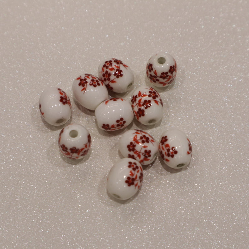 Perle ovale en céramique - motif fleuri (lot de 10)