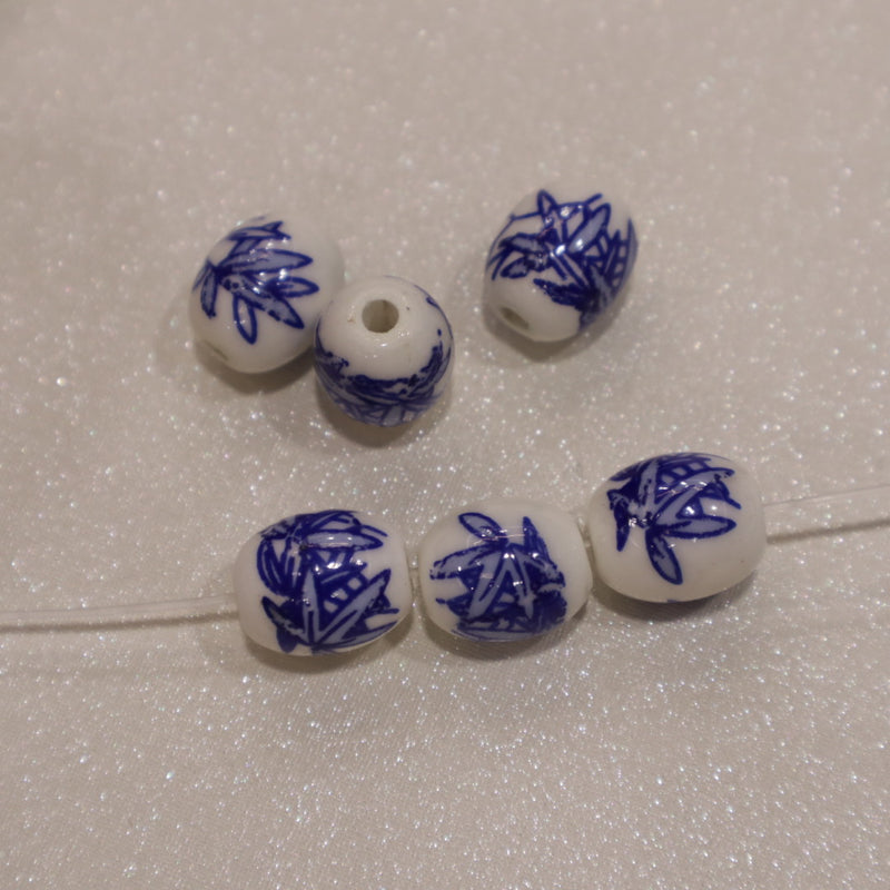 Perle ovale en céramique - motif fleuri (lot de 10)