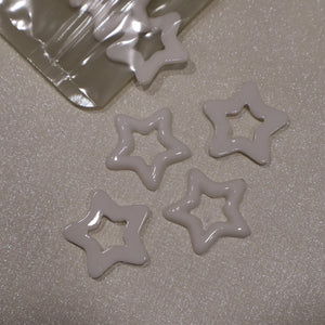 Étoiles ajourées en acrylique (lot de 10)