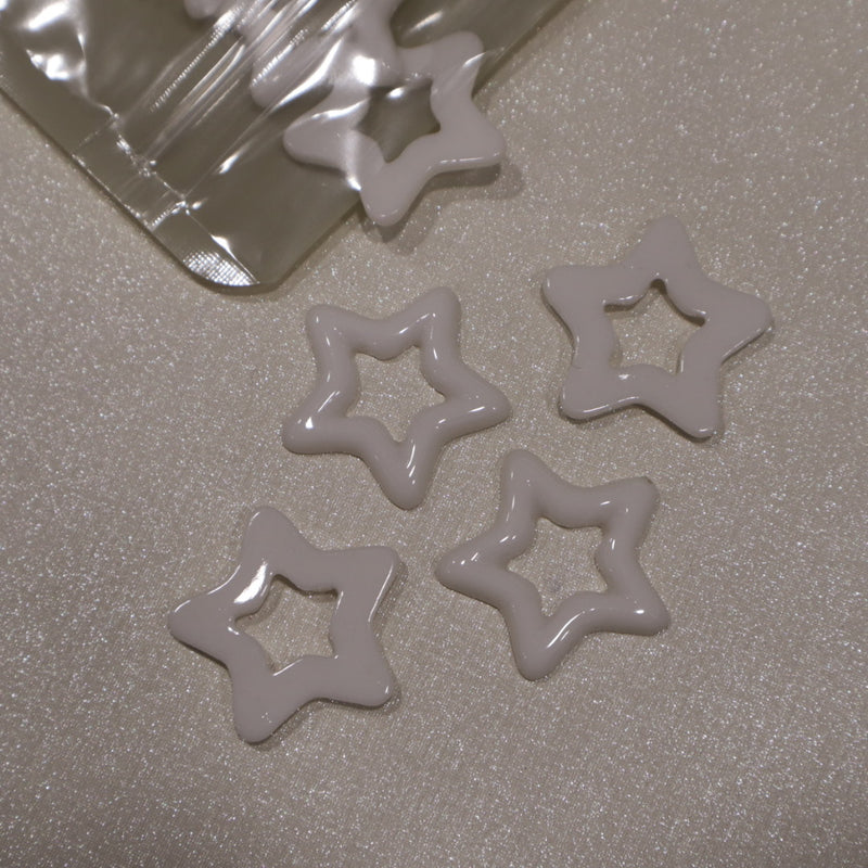 Étoiles ajourées en acrylique (lot de 10)