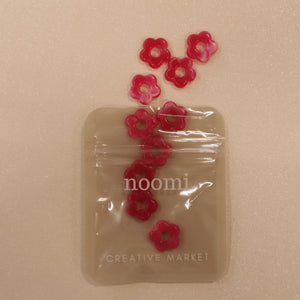 Fleur en acétate 15mm (lot de 10)