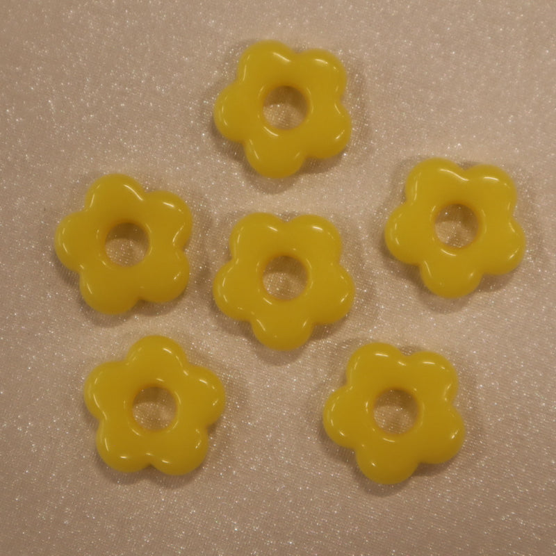 Fleur en acétate 15mm (lot de 10)